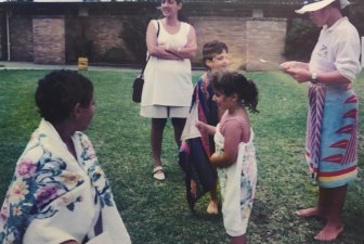 Yusra Metwally, aged about six, with her certificate, at Greenacre Pool.