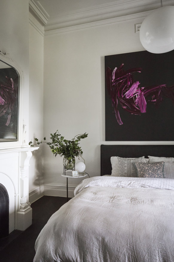 A work by Armstrong hangs in the main bedroom. “It’s so silent here at night, which we both really value after living on a busy Melbourne street,” she says.  
