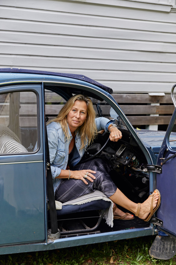 Boîtel-Gill with one of her beloved vintage cars, a 1985 Citroën 2CV.