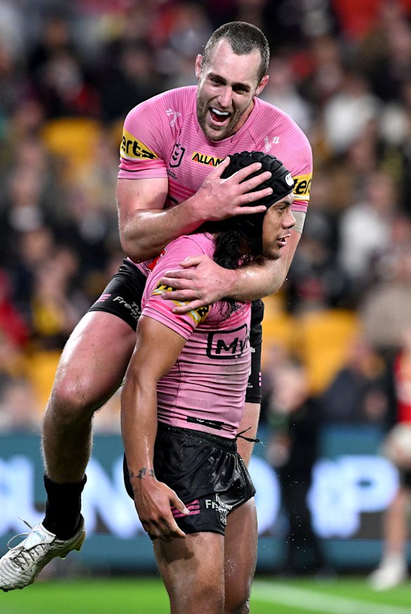 Luai and Yeo celebrate as Penrith teammates in 2024.