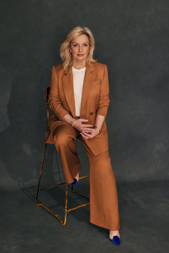 Christine wears Ginger & Smart jacket and pants, her own blouse, Saint Laurent shoes, and David Yurman jewellery.