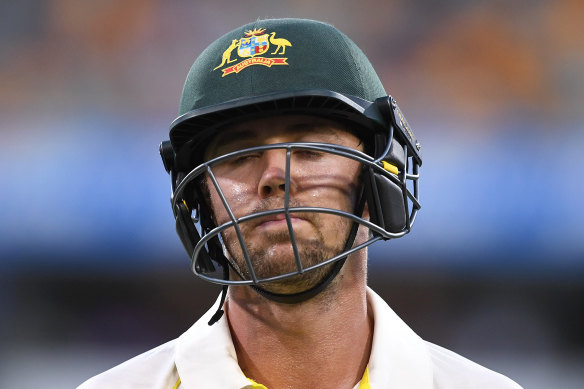 Poker face: Travis Head's look says it all after his dismissal.