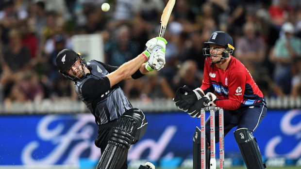 NZ's Martin Guptill edges a ball in front of England's Jos Buttler during the Twenty20 on Sunday.