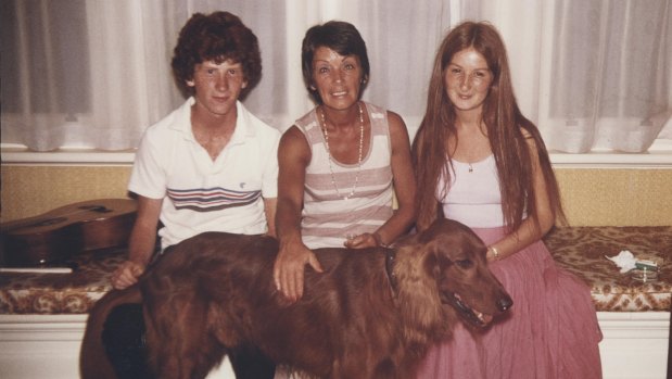 Paul Biegler in
1979 with his mother
Beryl, sister Sian and
family dog Morgan. 