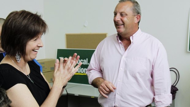 Michael Johnsen and his then-wife Zenda at his offices in 2013, before their split.