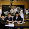Year 7 Trinity Grammar School students Kai Pham 12yrs, Max France 13 yrs and Kobe Manu 13yrs draw using pastels during art class. 