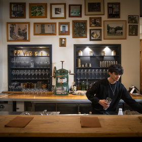 A photo gallery is found behind the bar.