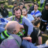 Counter-demonstrators clash with university security at Monash on Wednesday.