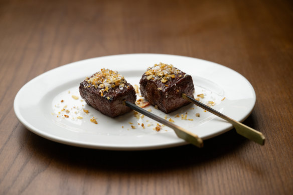 Wagyu cubes with sea salt and crisp garlic at Firepop.