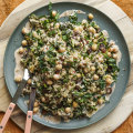 Chickpea, brown rice and greens salad with creamy harissa dressing.