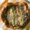 Rustic vegetarian quiche with greens and bagel seasoning.