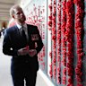 Prince Harry views the wall of remembrance at the Australian War Memorial.