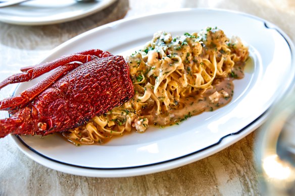 Lobster tagliatelle with bisque and soft herbs.