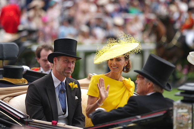 Kate, Princess of Wales and Prince William arrive in a carriage on the second day of the Royal Ascot
