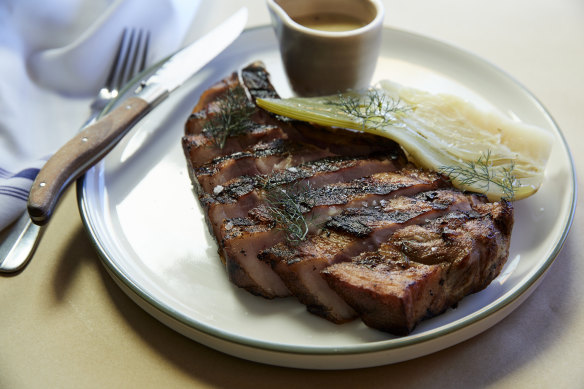 Chargrilled Hunter Valley pork cutlet with braised fennel and mustard sauce.