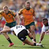 Max Jorgensen of the Wallabies takes on the defence