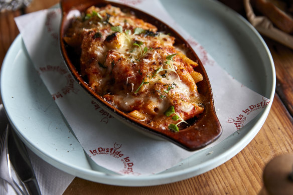 Penne al forno with pork sausage ragu.