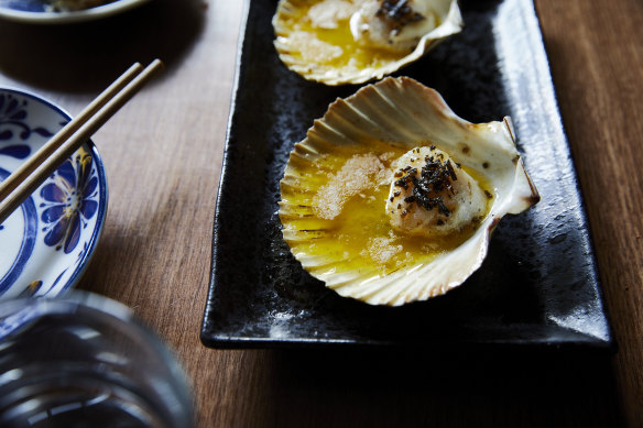 Butter-doused scallops grilled in the shell.