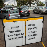Signs at a testing clinic in West Footscray on Saturday.