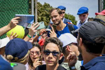 World No.2 Daniil Medvedev is mobbed by fans after training in the lead-up to the Geneva Open.