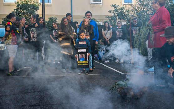 Donna Nelson (centre left), mother of Veronica Nelson, with family and friends at a smoking ceremony before the inquest into her daughter’s death