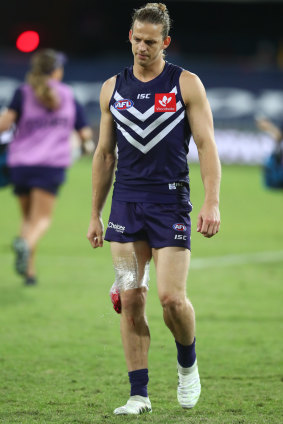 Nat Fyfe leaves the field injured during the round 4 match between the Gold Coast Suns and Fremantle.