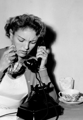 Australian war bride, Mrs Florence Doering receives a phone call from the US on 20 November 1957. 