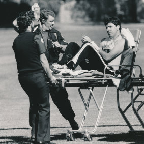 February 25, 1986: Rod MacDonald is stretchered from a Victoria Police helicopter after the shootout wth Marinof.