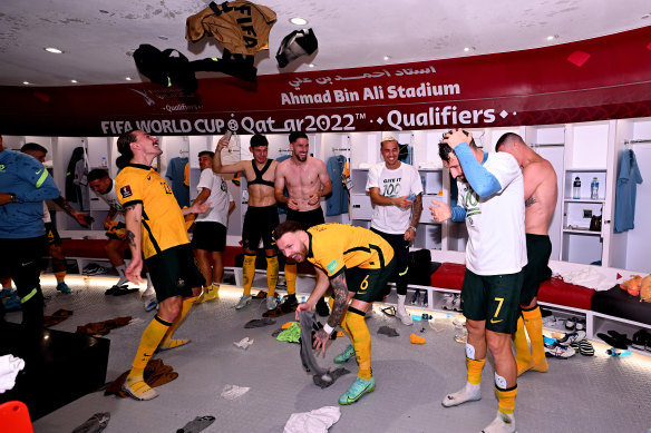 Jackson Irvine (left) celebrates Australia’s World Cup qualifying win over Peru.