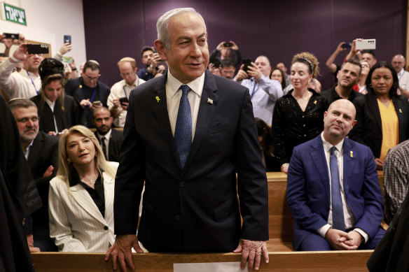 Israeli Prime Minister Benjamin Netanyahu arrives to attend a hearing at the district court for his long-running trial for alleged corruption, in Tel Aviv.