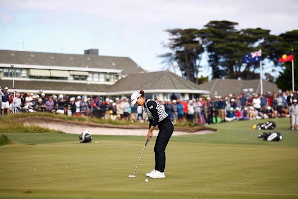 Australian golfer Minjee Lee puts in front of the clubhouse. 