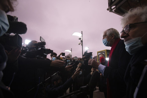 Lawyers George Henri Beauthier, second right, and William Bourdon, right, representing the National Council of Resistance of Iran, speak with the media as they arrive at the courthouse in Antwerp, Belgium.