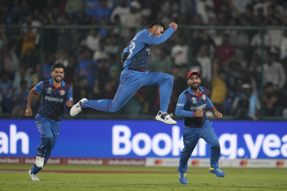 Afghanistan’s Mujeeb ur Rahman celebrates the wicket of England’s Chris Woakes.