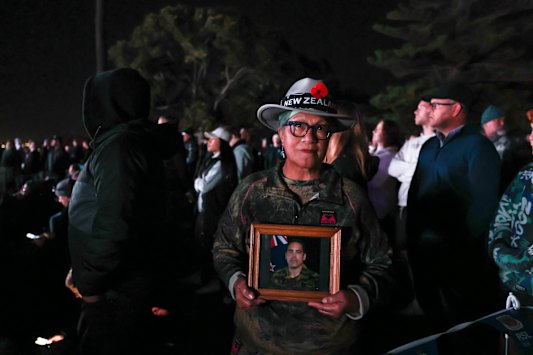 Daphne Langdon with a photo of Douglas Hughes, who passed in Afghanistan aged 26.