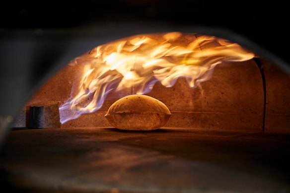 Blistered, wood-fired bread.
