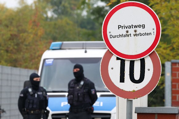 Police officers outside Henning’s home in Nordwalde, Germany, on Tuesday.