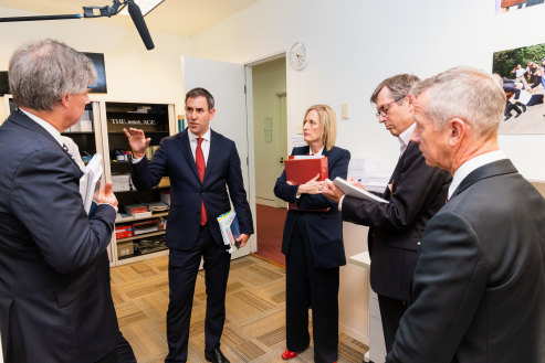 Treasurer Jim Chalmers and Finance Minister Katy Gallagher visit The Age office during the budget lock-up.