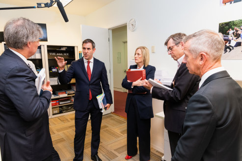 Treasurer Jim Chalmers and Finance Minister Katy Gallagher visit The Sydney Morning Herald office during the budget lock-up.