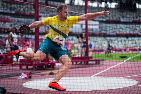 Matthew Denny competes in the discus throw.