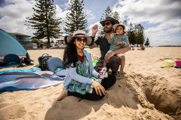 Ayesha Sunnooman, her husband Mohammad and their daughter Zaynab on Altona Beach on Australia Day.