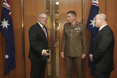 Prime Minister Scott Morrison with chief of the Defence Force General Angus Campbell and secretary of the Department of Defence Greg Moriarty.