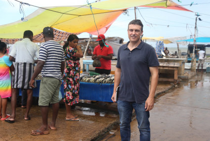 South-east Asia correspondent Chris Barrett at a fish market in Negombo while reporting in Sri Lanka this year.