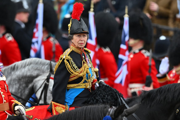 Princess Anne, Princess Royal rides on horseback behind the gold state coach carrying the newly crowned King and Queen as they travel down The Mall.