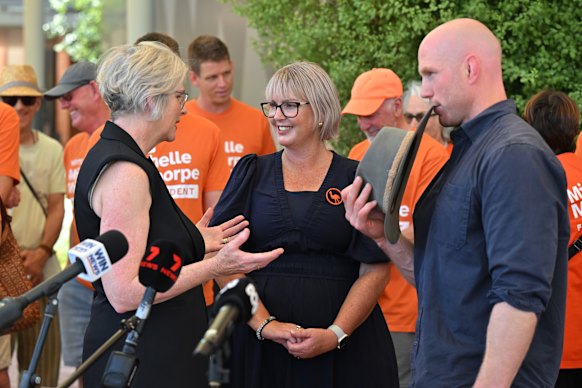 Independent candidate for Farrer Michelle Milthorpe (centre) with Independent member for Indi Helen Haines and  Independent Senator David Pocock after a press conference in Albury in February.