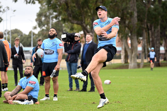 Making it rain: Matt Burton launches a ball to the heavens in Perth this week.