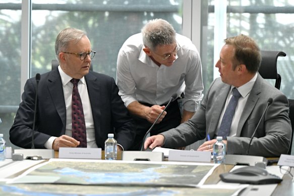 Prime Minister Anthony Albanese with Mike Kaiser (centre) and then-Queensland premier Steven Miles in December 2023.