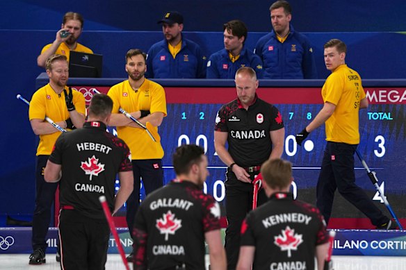 Frosty mood: The Sweden and Canadian teams up close.