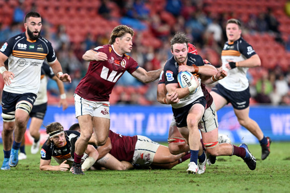 Ryan Lonergan of the Brumbies is tackled during the round 7 clash in Brisbane.