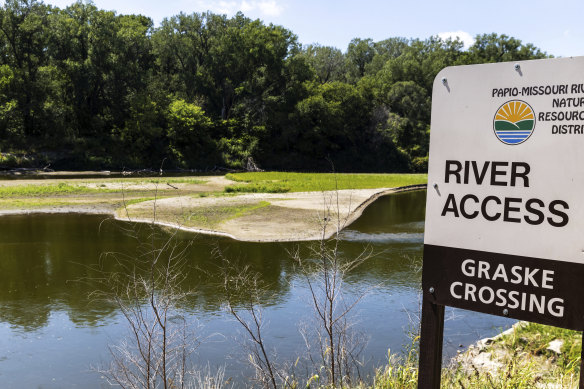 Health officials say a child likely died from a rare infection caused by a brain-eating amoeba after swimming in the Elkhorn River, picture, in eastern Nebraska on Sunday.