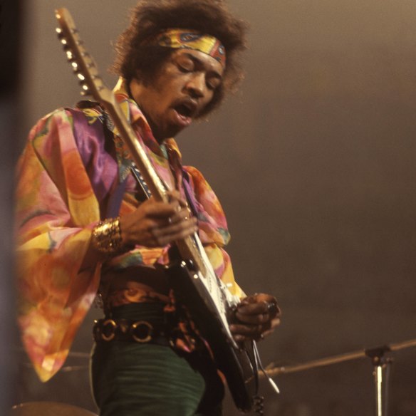 Jimi Hendrix performs live on stage playing a black Fender Stratocaster guitar with The Jimi Hendrix Experience at the Royal Albert Hall in London in February 1969. 